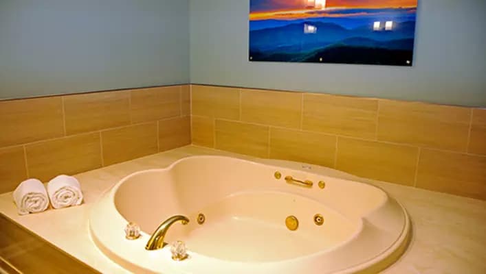 Full bathroom with whirlpool tub