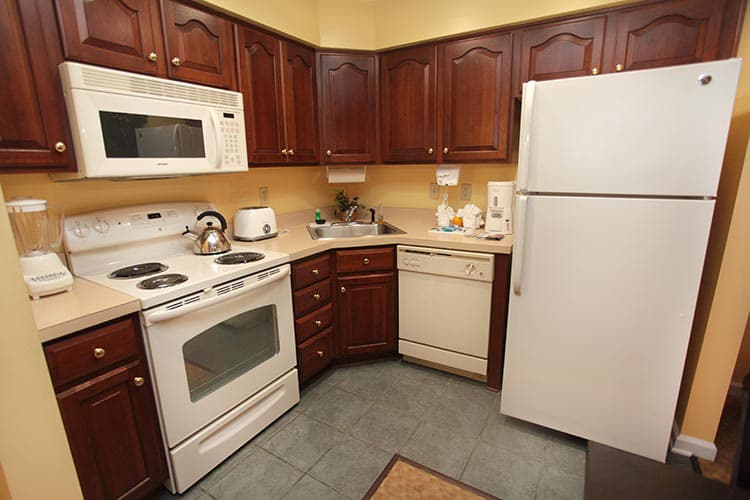 Full kitchen with full-size fridge and microwave